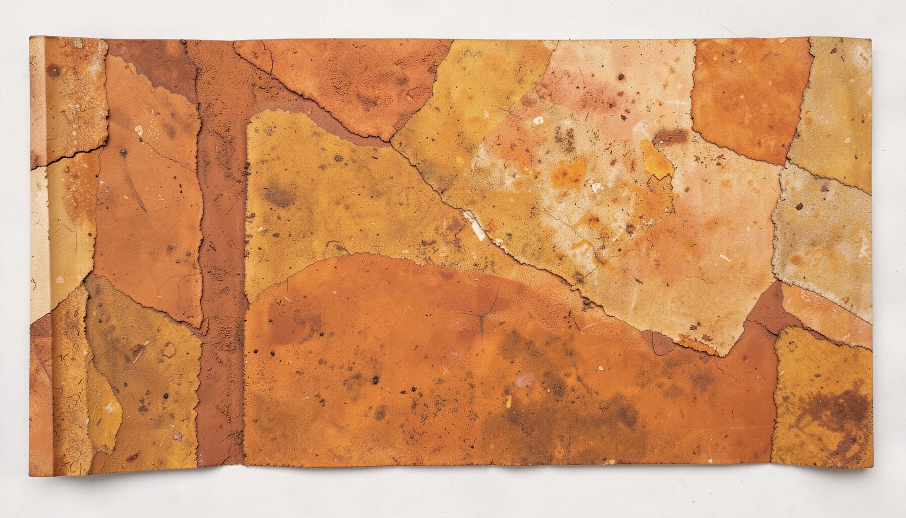 Earthy terracotta and ochre tones in a textured, layered abstract piece suggesting ancient manuscripts